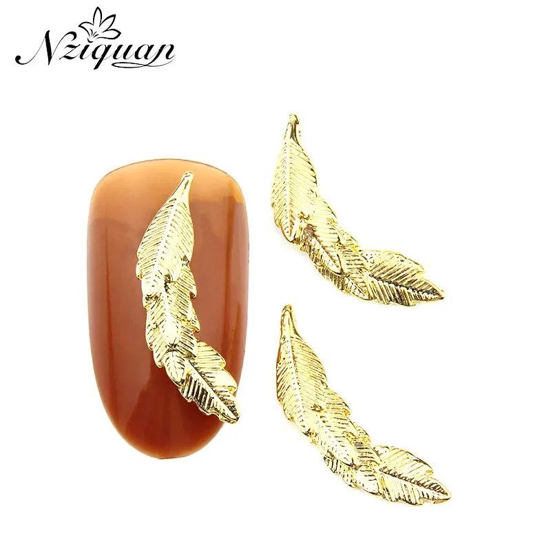 2020 Explosive NIZIQUAN 20pcs/bag Art Deco Golden Metal Feather 3D Nail Sticker Charm Alloy Jewelry Decoration DIY Nail Art 
2020 Explosive NIZIQUAN 20pcs/bag Art Deco Golden Metal Feather 3D Nail Sticker Charm Alloy Jewelry Decoration DIY Nail Art