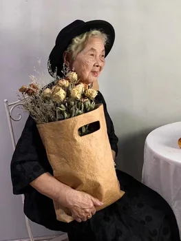 The Tyvek Waterproof KOM Tote Inspired by A ** Wang with Mc Downloads Gift Bag with no LOGO (It's available to customize a logo) 
The Tyvek Waterproof KOM Tote Inspired by A ** Wang with Mc Downloads Gift Bag with no LOGO (It's available to customize a logo)