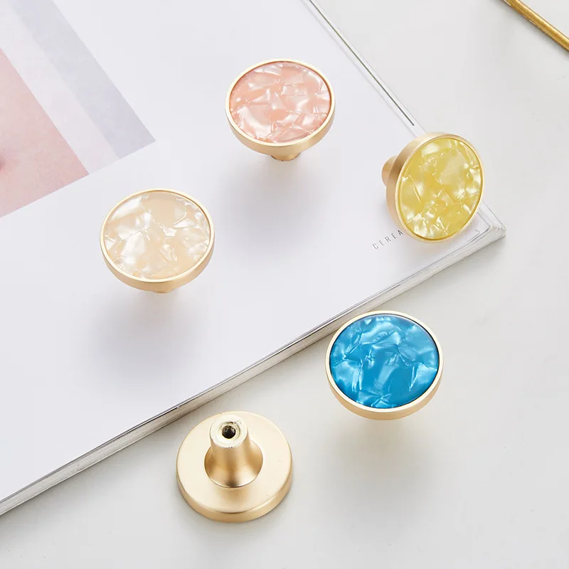 Nordic simple golden shell wardrobe door handle drawer single hole round handle coat hook
Nordic simple golden shell wardrobe door handle drawer single hole round handle coat hook