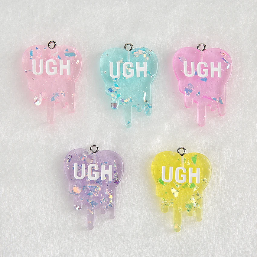 15pcs /lot 26*35mm Multicolor flat back resin UGH charms necklace pendant keychain charms for DIY earring decoration 
15pcs /lot 26*35mm Multicolor flat back resin UGH charms necklace pendant keychain charms for DIY earring decoration