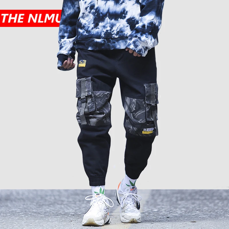 Hip Hip Camouflage Patchwork Cargo Pants Men Tactical Joggers Pant 2019 Autumn Casual Streetwear Trousers Elastic Waist WG549
Hip Hip Camouflage Patchwork Cargo Pants Men Tactical Joggers Pant 2019 Autumn Casual Streetwear Trousers Elastic Waist WG549