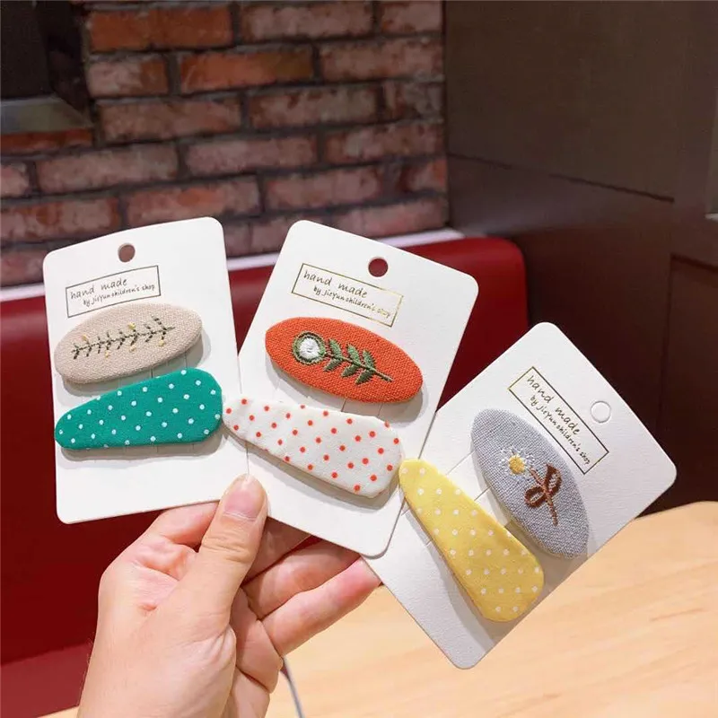 Korean Version Of Cloth Solid Color Hair Clip Embroidery Plant Multi-Sided Hair Clip Triangle Dot Hair Accessories
Korean Version Of Cloth Solid Color Hair Clip Embroidery Plant Multi-Sided Hair Clip Triangle Dot Hair Accessories