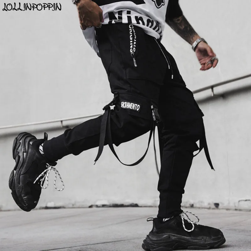 Punk Men Tactical Jogger Pants Buckle Strap Pockets Hip Hop Streetwear Drawstring Elastic Waist Mens Tapered Cargo Pants
Punk Men Tactical Jogger Pants Buckle Strap Pockets Hip Hop Streetwear Drawstring Elastic Waist Mens Tapered Cargo Pants