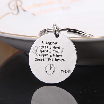 FLYANGEL Teacher Gifts Keychain Customized Name Keyring Jewelry Engraved A Teacher Shape The Further Teacher's Day Gifts
FLYANGEL Teacher Gifts Keychain Customized Name Keyring Jewelry Engraved A Teacher Shape The Further Teacher's Day Gifts