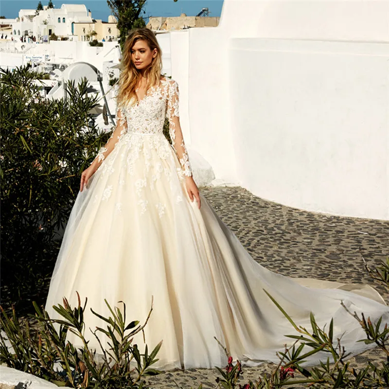 2021 Scoop Long Sleeves Lace Appliques A-Line Wedding Dress Buttons Back Custom Made Spring Bridal Gowns Princess Garden Wedding
2021 Scoop Long Sleeves Lace Appliques A-Line Wedding Dress Buttons Back Custom Made Spring Bridal Gowns Princess Garden Wedding
