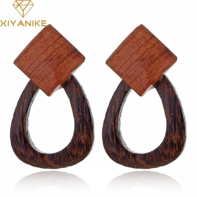 XIYANIKE 2019 Vintage Hollow Oval Wooden Earrings Jewelry Geometric Natural Wood Boho Statement Dangle Earrings For Women Gif
XIYANIKE 2019 Vintage Hollow Oval Wooden Earrings Jewelry Geometric Natural Wood Boho Statement Dangle Earrings For Women Gif