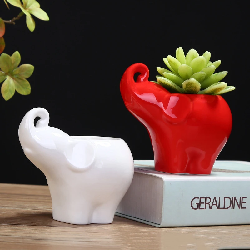 Creative Ceramic Flower Ware / Animal Elephant Color Glaze White Porcelain Multi Meat Flowerpot / Handicraft Ornament With Holes
Creative Ceramic Flower Ware / Animal Elephant Color Glaze White Porcelain Multi Meat Flowerpot / Handicraft Ornament With Holes