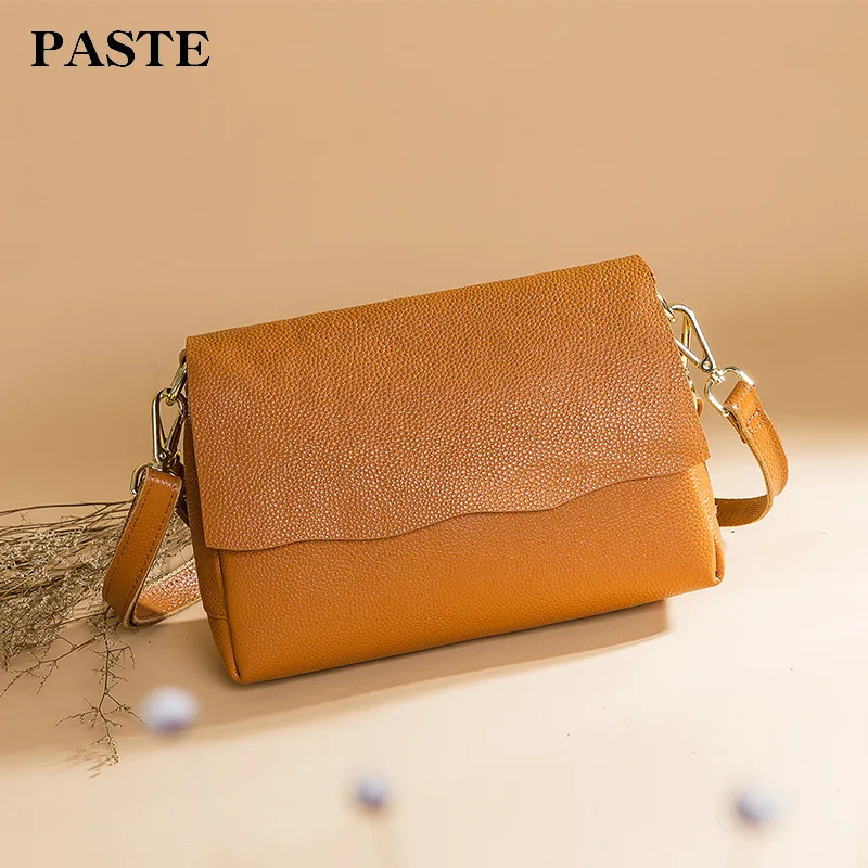 2020 Summer Head Layer Cowhide Flip Cover Single Shoulder Portable Oblique Satchel Joker Genuine Leather Female Bag 2005
2020 Summer Head Layer Cowhide Flip Cover Single Shoulder Portable Oblique Satchel Joker Genuine Leather Female Bag 2005