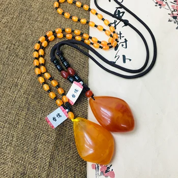 Zheru natural beeswax brown yellow water drop pendant with beeswax bead necklace exquisite men and women sweater chain
Zheru natural beeswax brown yellow water drop pendant with beeswax bead necklace exquisite men and women sweater chain