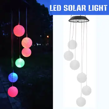 Solar Color Changing LED Snowflack Wind Chimes Light Waterproof Home Garden Hanging Lights LED Solar Lamps Christmas Decoration 
Solar Color Changing LED Snowflack Wind Chimes Light Waterproof Home Garden Hanging Lights LED Solar Lamps Christmas Decoration