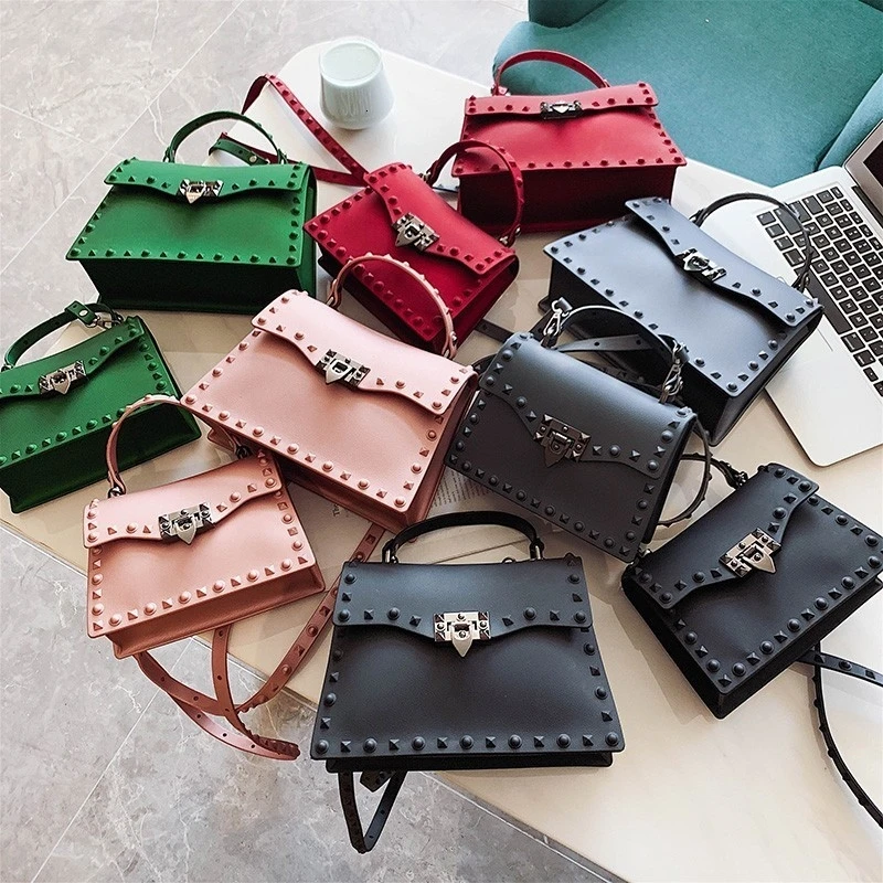 PVC hard rivet female handbags 2020 new black red green candy color young girls single shoulder bags brand women crossbody bags 
PVC hard rivet female handbags 2020 new black red green candy color young girls single shoulder bags brand women crossbody bags
