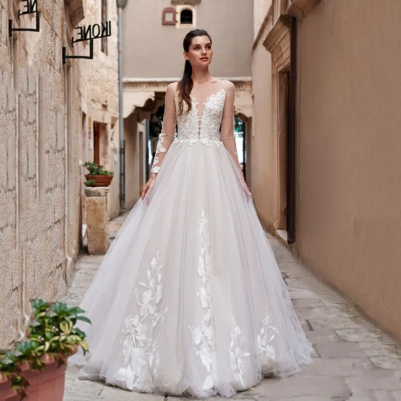 Thinyfull Elegant A Line Long Sleeve Wedding Dresses Sheer Scoop Neck Bride Dresses Button Tulle Lace Appliques Bridal Gown 2020
Thinyfull Elegant A Line Long Sleeve Wedding Dresses Sheer Scoop Neck Bride Dresses Button Tulle Lace Appliques Bridal Gown 2020