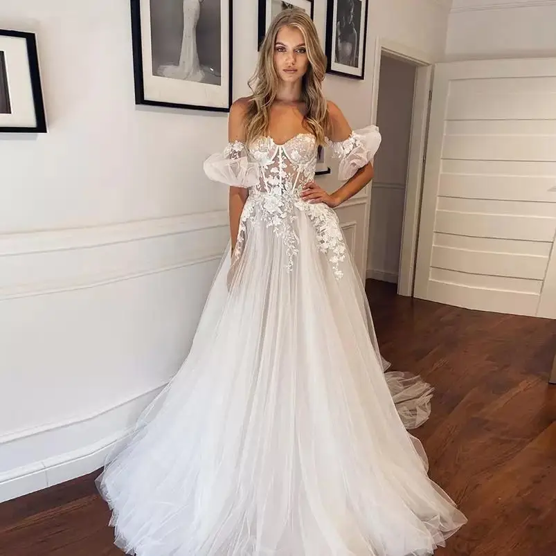 Off Shoulder A Line Lace Wedding Dresses For Women Bridal Gowns with Appliques Sweep Train Tulle Boho Beach Bride Dress Robe
Off Shoulder A Line Lace Wedding Dresses For Women Bridal Gowns with Appliques Sweep Train Tulle Boho Beach Bride Dress Robe