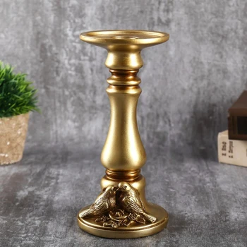 Polystone candlestick for 1 candle "Column with birds" gold 21x10x10 cm 4641732
Polystone candlestick for 1 candle "Column with birds" gold 21x10x10 cm 4641732