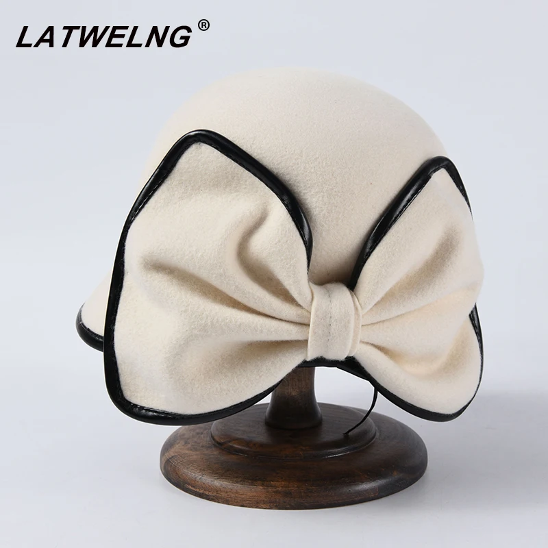 2019 New Ladies Elegant Big Bow Bucket High Quality Wool Fedoras Top Hat For Women Autumn Winter Church Dress Cap Derby Hats
2019 New Ladies Elegant Big Bow Bucket High Quality Wool Fedoras Top Hat For Women Autumn Winter Church Dress Cap Derby Hats