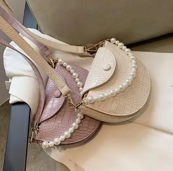 Crocodile pattern Pearl Tote Saddle bag 2020 New High quality PU Leather Women's Designer Handbag Travel Shoulder Messenger Bag
Crocodile pattern Pearl Tote Saddle bag 2020 New High quality PU Leather Women's Designer Handbag Travel Shoulder Messenger Bag