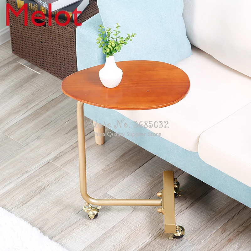 Creative simple oval tea table mobile solid wood wrought iron sofa corner a few lazy bedside reading table
Creative simple oval tea table mobile solid wood wrought iron sofa corner a few lazy bedside reading table