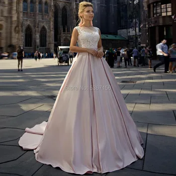 Blush Pink Satin Wedding Dresses 2020 Scoop Sleeveless A line Lace Appliques Bridal Gowns Illusion Court Train Vestidos De Noiva
Blush Pink Satin Wedding Dresses 2020 Scoop Sleeveless A line Lace Appliques Bridal Gowns Illusion Court Train Vestidos De Noiva