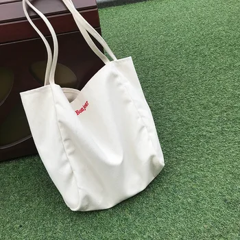 Washed canvas style simple canvas bag shoulder bag shopping bag super large capacity environmental protection bag 
Washed canvas style simple canvas bag shoulder bag shopping bag super large capacity environmental protection bag