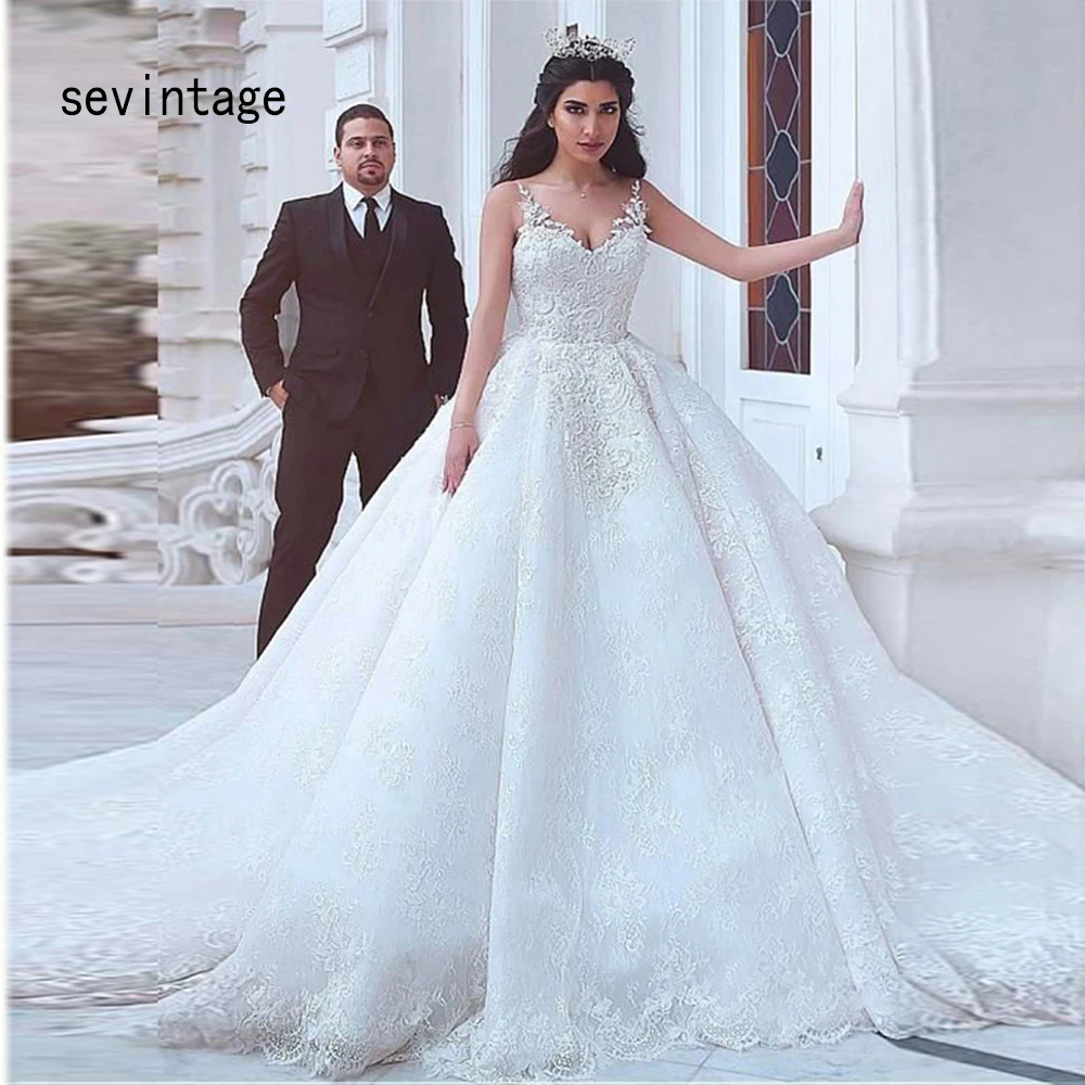 Latest Muslim Bride Dress V Neck Spaghetti Strap Wedding Dresses Appliques Lace Uprobe de mariee Back Floor Length Bridal Gowns
Latest Muslim Bride Dress V Neck Spaghetti Strap Wedding Dresses Appliques Lace Uprobe de mariee Back Floor Length Bridal Gowns