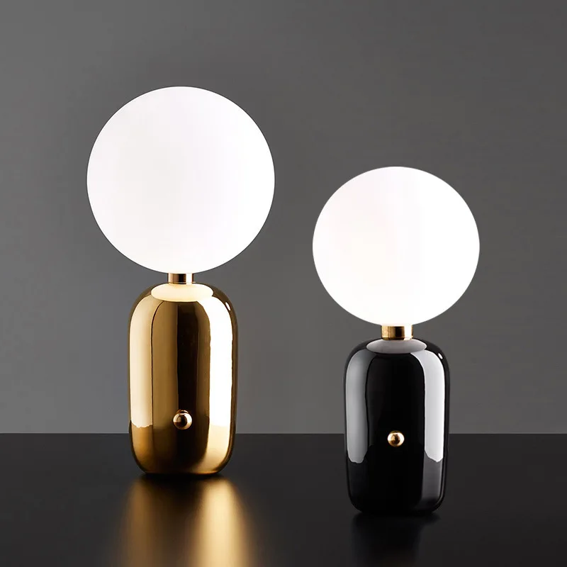 Nordic modern minimalist table lamps for living room white glass ball table light iron tripod milky round ball desk lamp Reading
Nordic modern minimalist table lamps for living room white glass ball table light iron tripod milky round ball desk lamp Reading