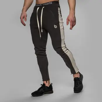 Men Sports Running Pants cotton solid color zipper pants Gym jogging pants men brand sports pants quality men's trousers 
Men Sports Running Pants cotton solid color zipper pants Gym jogging pants men brand sports pants quality men's trousers