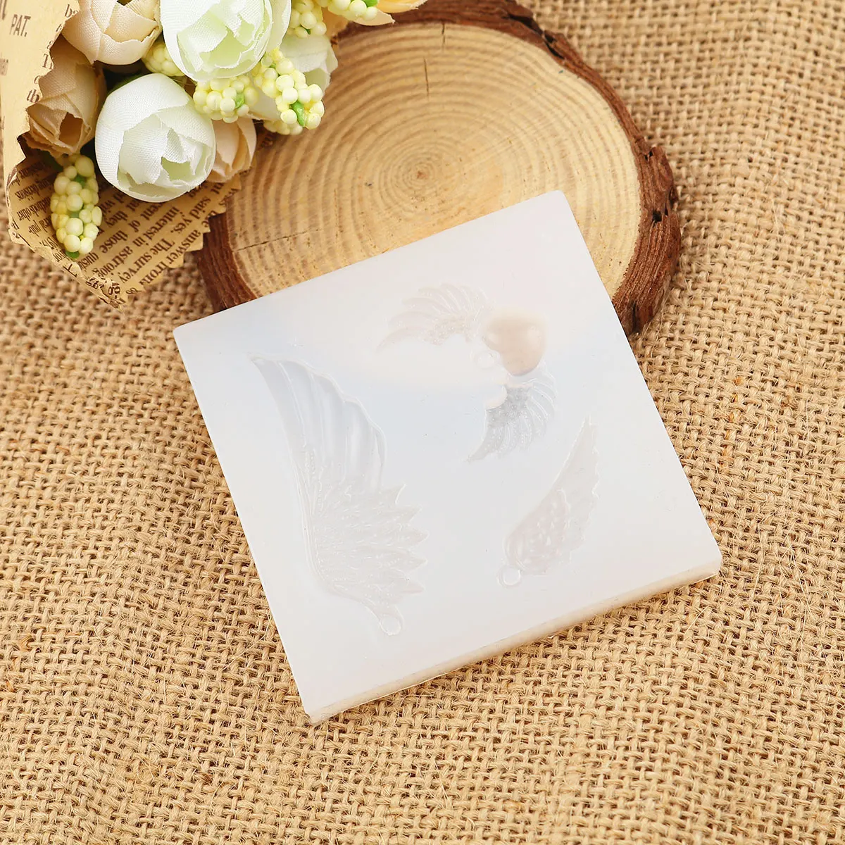 Silicone resin mold for jewelry making square wing epoxy mold perforated wings and peach heart pattern about 6.8x6.8cm 1 piece
Silicone resin mold for jewelry making square wing epoxy mold perforated wings and peach heart pattern about 6.8x6.8cm 1 piece