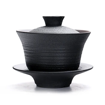 Black pottery kung fu tea set Zen style ceramic tea ceremony making cover bowl hand holding pot tureen ceramic teaware
Black pottery kung fu tea set Zen style ceramic tea ceremony making cover bowl hand holding pot tureen ceramic teaware