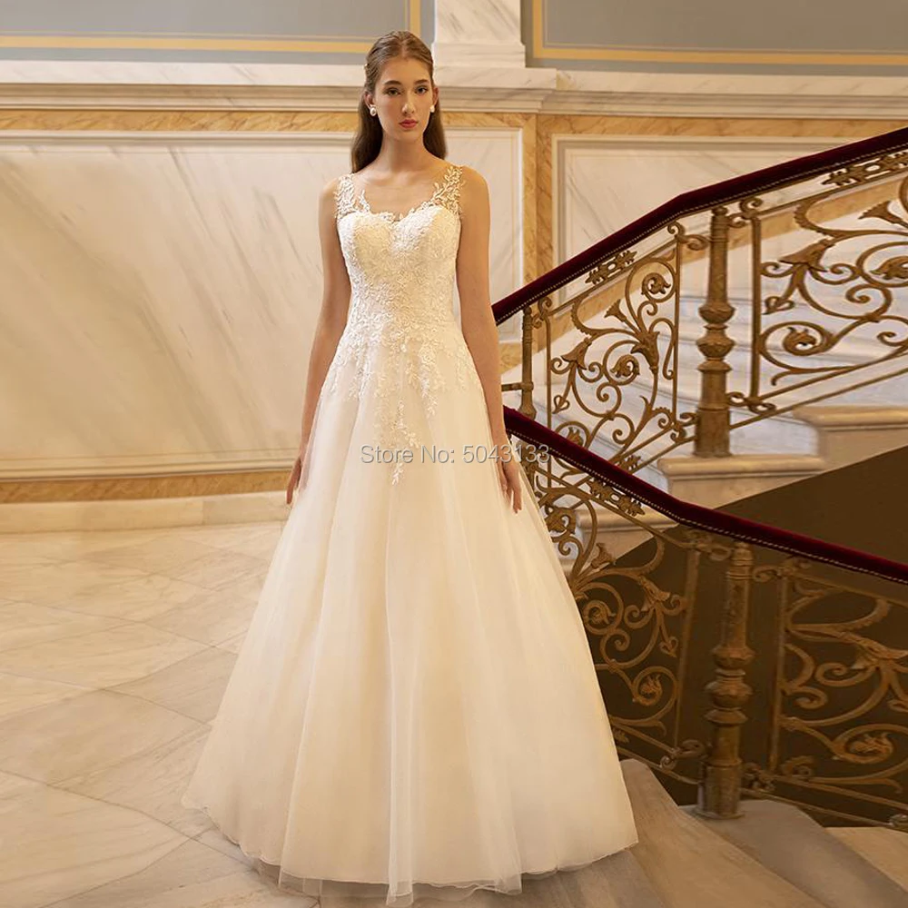 Lace Applique A Line Wedding Dresses 2019 Sexy Off the Shoulder Sleeveless Sweep Train Wedding Bridal Gowns Sheer Buttons Back
Lace Applique A Line Wedding Dresses 2019 Sexy Off the Shoulder Sleeveless Sweep Train Wedding Bridal Gowns Sheer Buttons Back