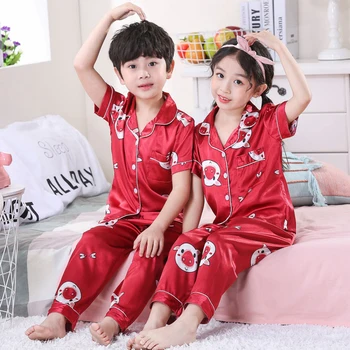 Children Pajamas Suit 2020 Summer Kids Cartoon Silk Pajamas Boys Homewear Stain Girls Short Sleeve Button Cardigan Pyjamas Set
Children Pajamas Suit 2020 Summer Kids Cartoon Silk Pajamas Boys Homewear Stain Girls Short Sleeve Button Cardigan Pyjamas Set