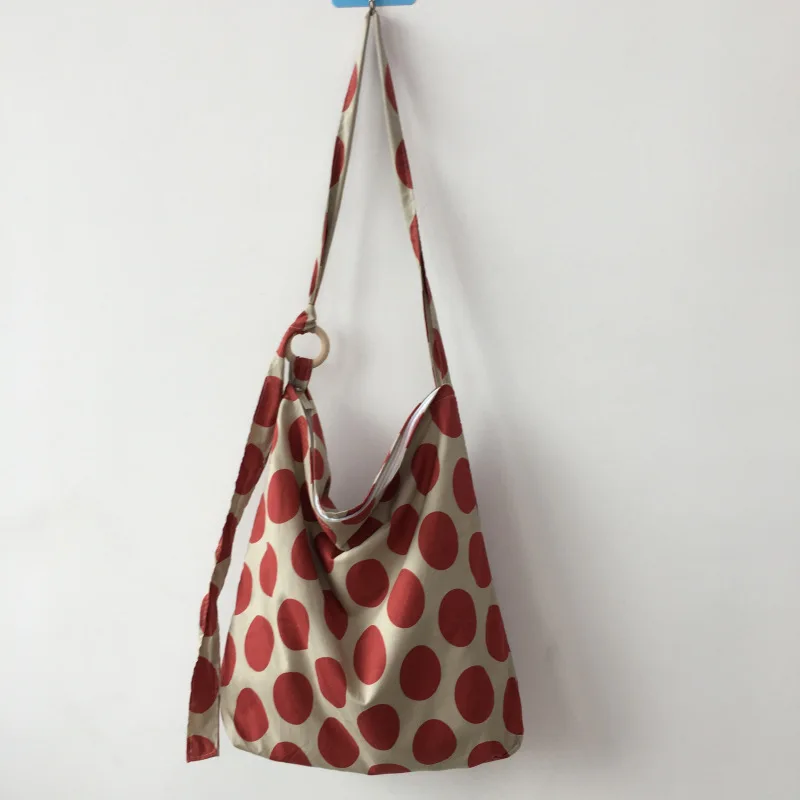 Summer Chic Wave Point Canvas handbag Ins Women's Single Shoulder Zipper Round Bucket Bowknot Dot Crossbody Bag Market Bag
Summer Chic Wave Point Canvas handbag Ins Women's Single Shoulder Zipper Round Bucket Bowknot Dot Crossbody Bag Market Bag