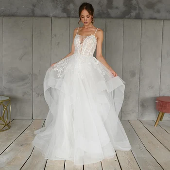 Elegant Organza Tulle A-line Wedding Gowns 2020 Sexy Spaghetti Straps Appliques Sequins Square CollarSleeveless Bridal Dress
Elegant Organza Tulle A-line Wedding Gowns 2020 Sexy Spaghetti Straps Appliques Sequins Square CollarSleeveless Bridal Dress