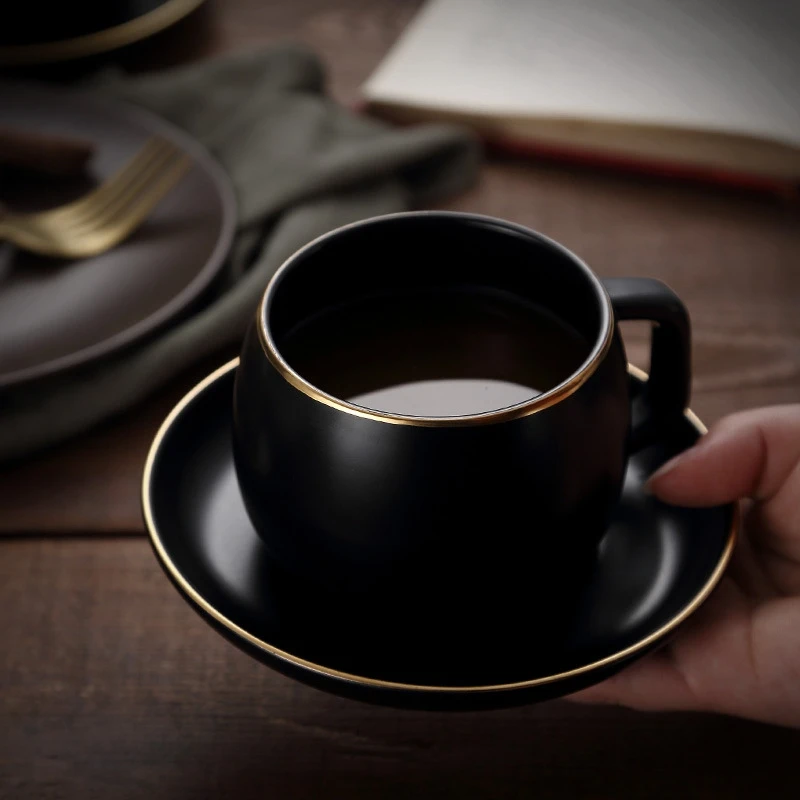 Ceramic Coffee Cup and Saucer Black Pigmented Porcelain Tea Cup Set 
Ceramic Coffee Cup and Saucer Black Pigmented Porcelain Tea Cup Set
