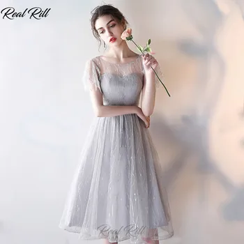 RealRill Illusion Boat Neck Bridesmaid Dresses Cap Sleeves Lace Up Back Knee Length A-Line Wedding Guest Dress For Wedding Party 
RealRill Illusion Boat Neck Bridesmaid Dresses Cap Sleeves Lace Up Back Knee Length A-Line Wedding Guest Dress For Wedding Party