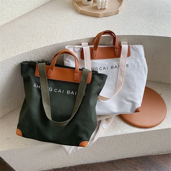 Famous Brand Women Commute Canvas Handbags Large Capacity Ladies Travel Hand Bags High Quality Designer Shoulder Bags for Women
Famous Brand Women Commute Canvas Handbags Large Capacity Ladies Travel Hand Bags High Quality Designer Shoulder Bags for Women