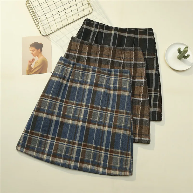 women's casual Basic woolen plaid skirt Korean version autumn / winter high waist and light proof A-line skirt short skirt 
women's casual Basic woolen plaid skirt Korean version autumn / winter high waist and light proof A-line skirt short skirt