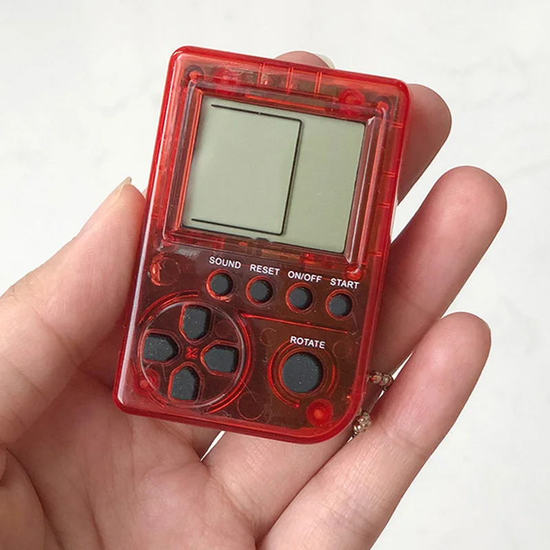 Child Gift Keychain Game Console Tetris Mini Handheld Game Player capsule toy twisted egg Built-in 26 Games for Kids
Child Gift Keychain Game Console Tetris Mini Handheld Game Player capsule toy twisted egg Built-in 26 Games for Kids
