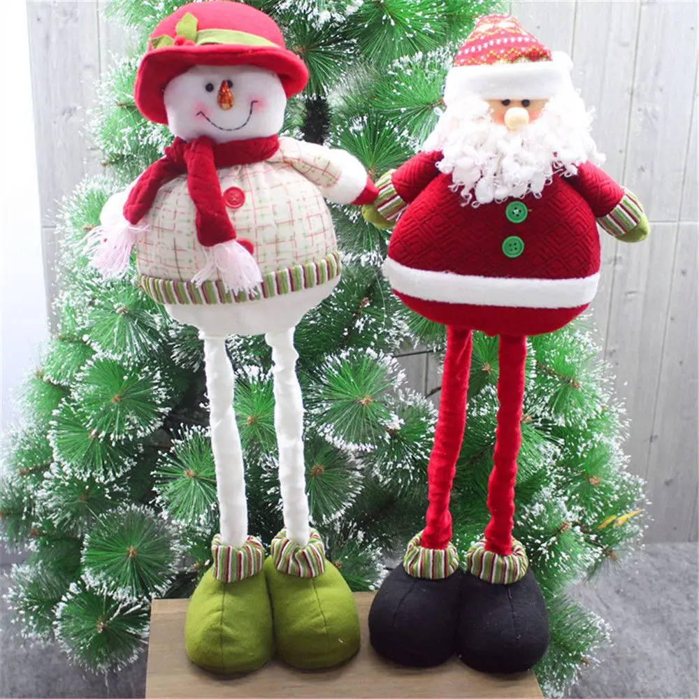 arranging window for tree santa claus snowman toys figurines