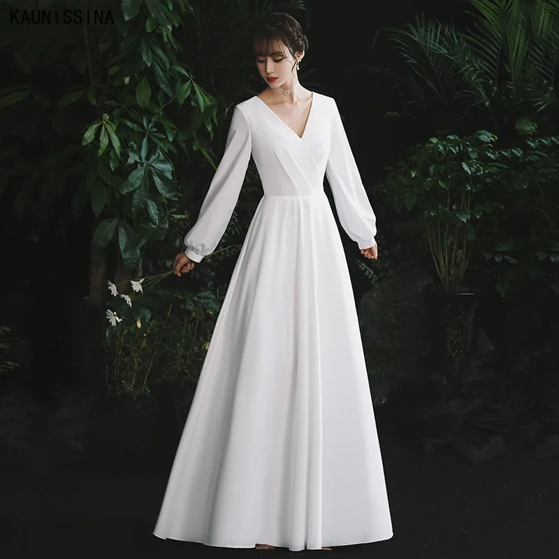 KAUNISSINA Satin Beach Wedding Dresses V-Neck Long Sleeves White Simple Bride Dresses Women Elegant Backless A-Line Bridal Gowns
KAUNISSINA Satin Beach Wedding Dresses V-Neck Long Sleeves White Simple Bride Dresses Women Elegant Backless A-Line Bridal Gowns