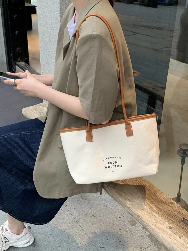 Casual Large-capacity Canvas Shoulder Bag Wild Letter Printing Tote Shoulder Bag Fashion
Casual Large-capacity Canvas Shoulder Bag Wild Letter Printing Tote Shoulder Bag Fashion