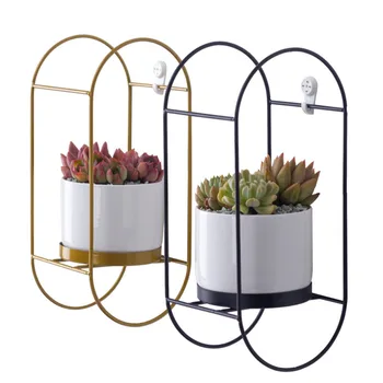 Firm and durable simple wall hanging oval iron frame stable load-bearing circular combination ceramic flowerpot is not e
Firm and durable simple wall hanging oval iron frame stable load-bearing circular combination ceramic flowerpot is not e