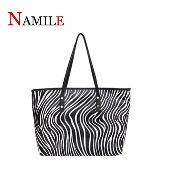 Ladies large-capacity luxury zebra pattern handbags, ladies all-match soft leather shoulder bags, trendy women's handbags
Ladies large-capacity luxury zebra pattern handbags, ladies all-match soft leather shoulder bags, trendy women's handbags