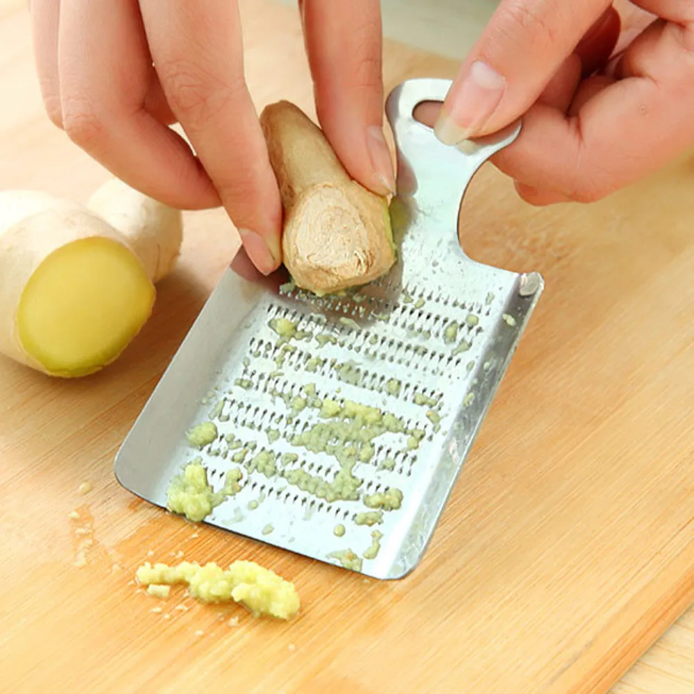 Stainless Steel Practical Kitchen Ginger Fashion Design Hollow Out Hand Wasabi Garlic Grater Bento Mill Tool Kitchen Accessory
Stainless Steel Practical Kitchen Ginger Fashion Design Hollow Out Hand Wasabi Garlic Grater Bento Mill Tool Kitchen Accessory