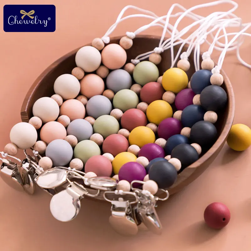 1pc Silicone Pacifier Metal Clips Chain Wooden Beads Tiny Rod Silicone Baby Teether Toys Rodent Teething Chain Childen's Goods
1pc Silicone Pacifier Metal Clips Chain Wooden Beads Tiny Rod Silicone Baby Teether Toys Rodent Teething Chain Childen's Goods