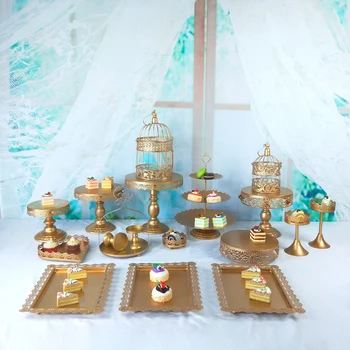 Tobs metal gold cake stand set for wedding cup cake holder decorating tools candy bar stand tray suppliers 
Tobs metal gold cake stand set for wedding cup cake holder decorating tools candy bar stand tray suppliers