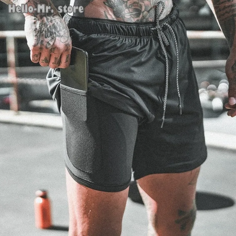 Double layer Jogger Shorts Men 2 in 1 Short Pants Gyms Fitness Built-in pocket Bermuda Quick Dry Beach Shorts Male Sweatpants
Double layer Jogger Shorts Men 2 in 1 Short Pants Gyms Fitness Built-in pocket Bermuda Quick Dry Beach Shorts Male Sweatpants