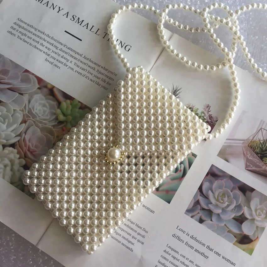 Retro Non-mainstream Vintage Medium Tip Cover Pearl Mobile Phone Bag Hand-woven String
Retro Non-mainstream Vintage Medium Tip Cover Pearl Mobile Phone Bag Hand-woven String