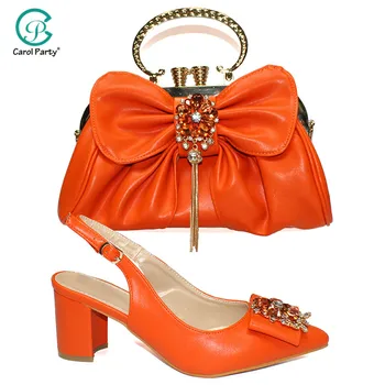 New Arrival Italian design Orange Color African Women Matching Shoes and Bag Set Decorated with Rhinestone Ladies Shoe and Bag
New Arrival Italian design Orange Color African Women Matching Shoes and Bag Set Decorated with Rhinestone Ladies Shoe and Bag
