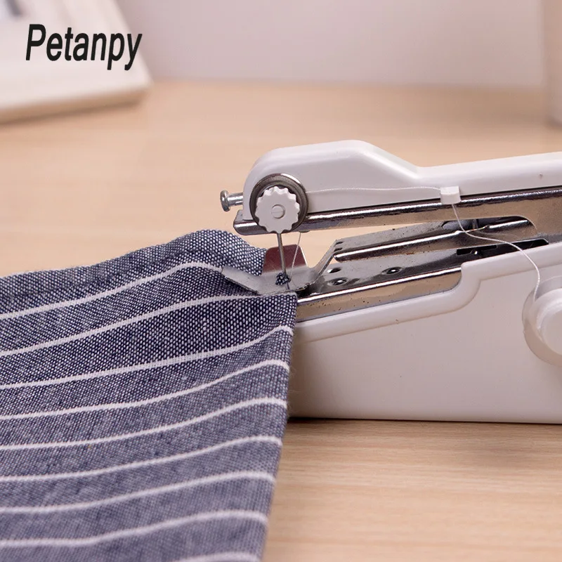 Portable Household Mini Hand Sewing Machine Quick Stitch Sew Needlework Cordless Clothes Fabrics Electronic Sewing Machine
Portable Household Mini Hand Sewing Machine Quick Stitch Sew Needlework Cordless Clothes Fabrics Electronic Sewing Machine