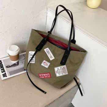 Large capacity bag women's fashion autumn / winter 2020 new canvas bag badge texture single shoulder portable Tote Bag Ladies ba
Large capacity bag women's fashion autumn / winter 2020 new canvas bag badge texture single shoulder portable Tote Bag Ladies ba